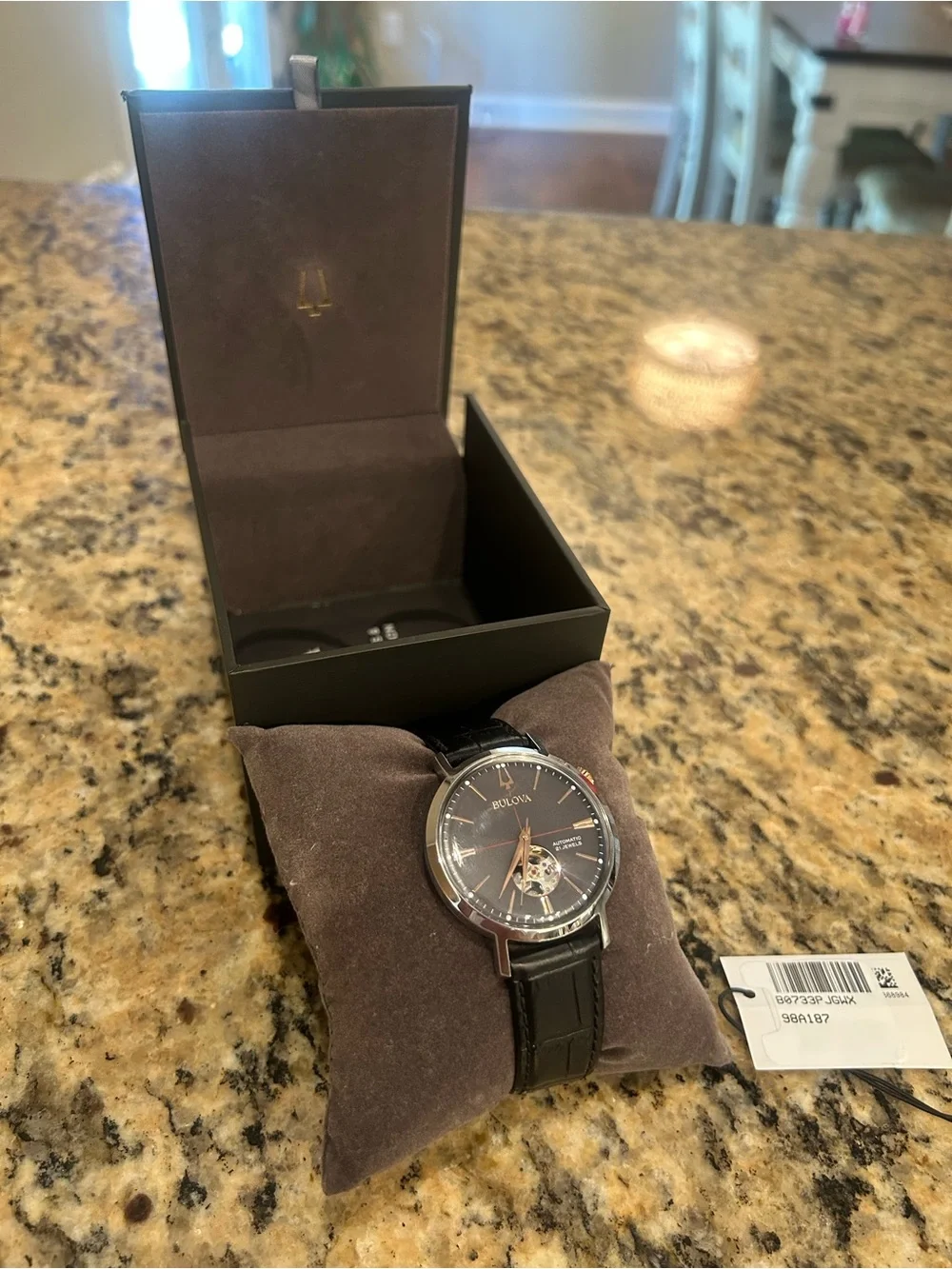 Bulova Black Dial Watch with Rose-Gold Accents and Black Leather Strap.